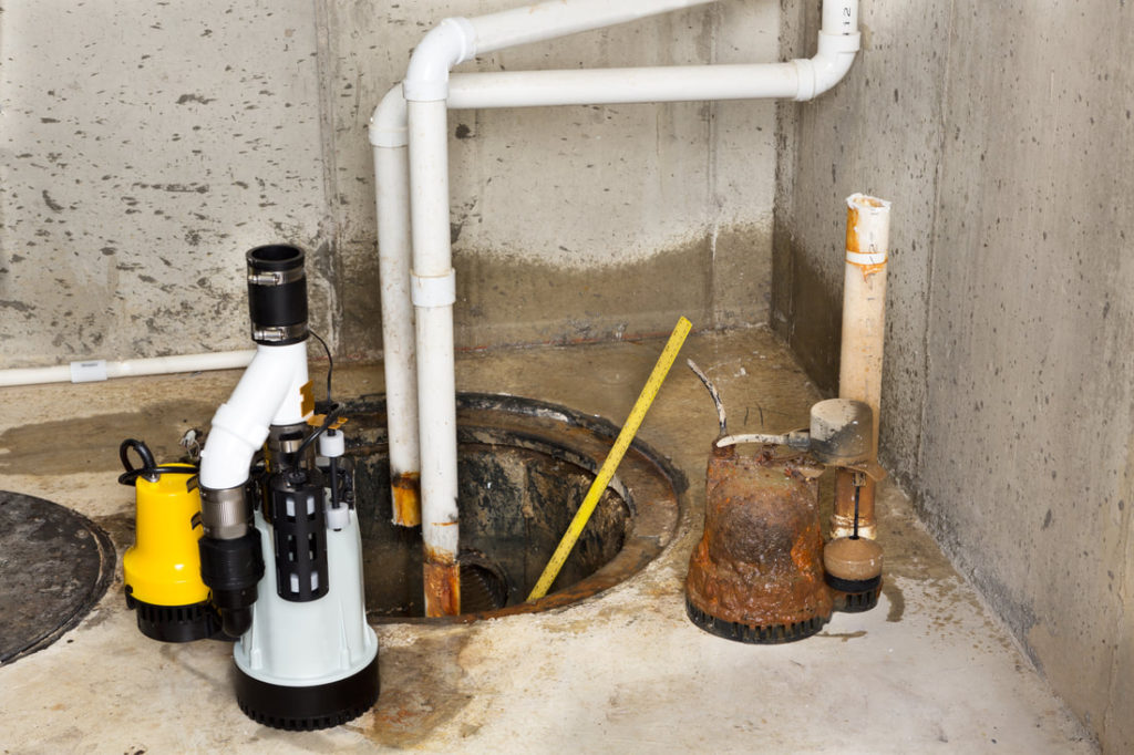 This Is A Picture Of A Sump Pump System That Was Installed And Needs Some Maintenance By Erie Pa Plumbers