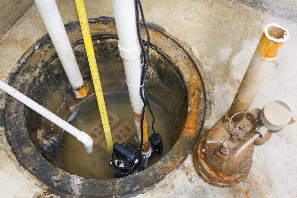 This Is A Picture Of A Sump Pump System That Was Installed And Needs A New Pump Installed After Dying Plumbers In Erie Pa